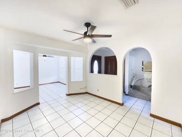a view of livingroom with furniture and white walls