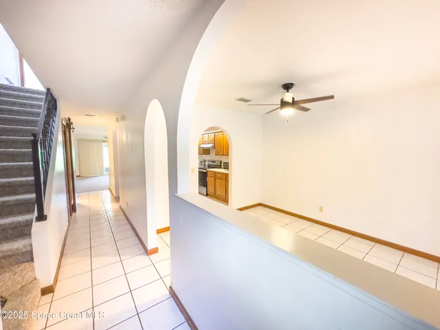 a view of a living room with a balcony