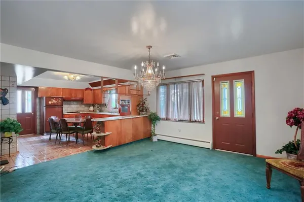 a dining table with chairs and wooden floor