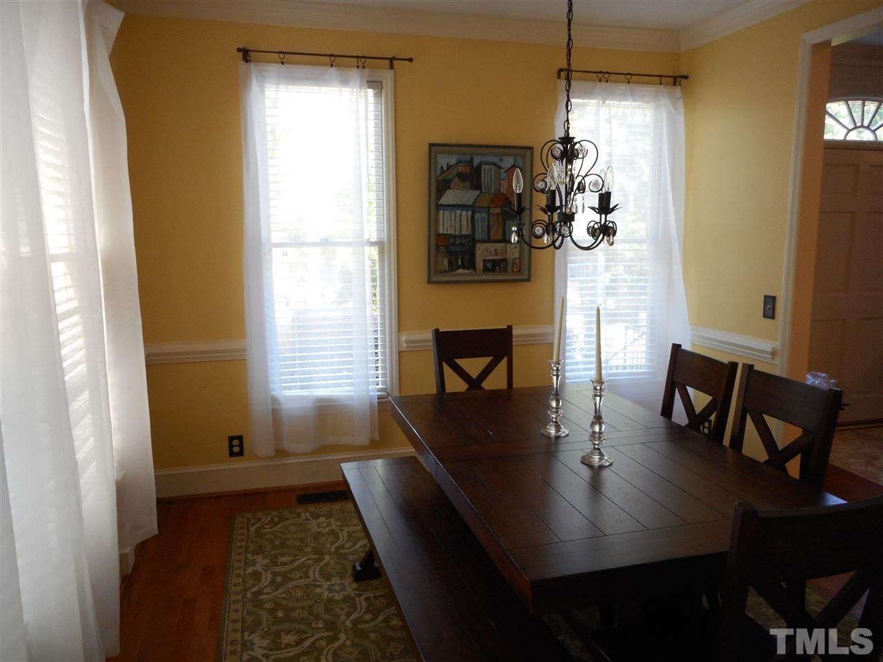 6809 Chasewick Circle Raleigh, NC 27615 - Photo 11 of 23 Very light with windows on 2 sides, hardwood floors, neutral colors.
