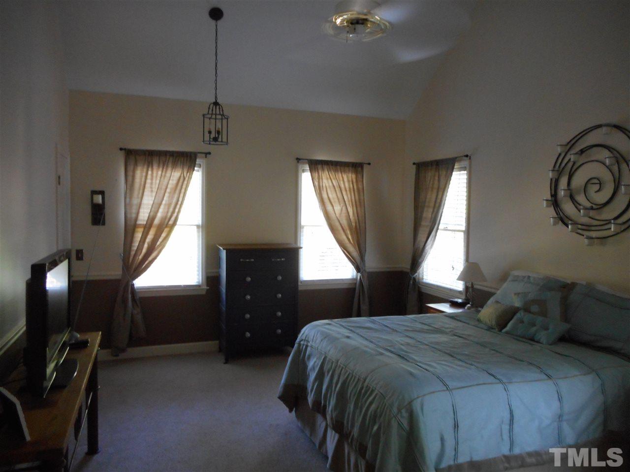 6809 Chasewick Circle Raleigh, NC 27615 - Photo 16 of 23 Check out the cathedral ceiling! Very large master, windows on two sides, and his and hers walk in closets!