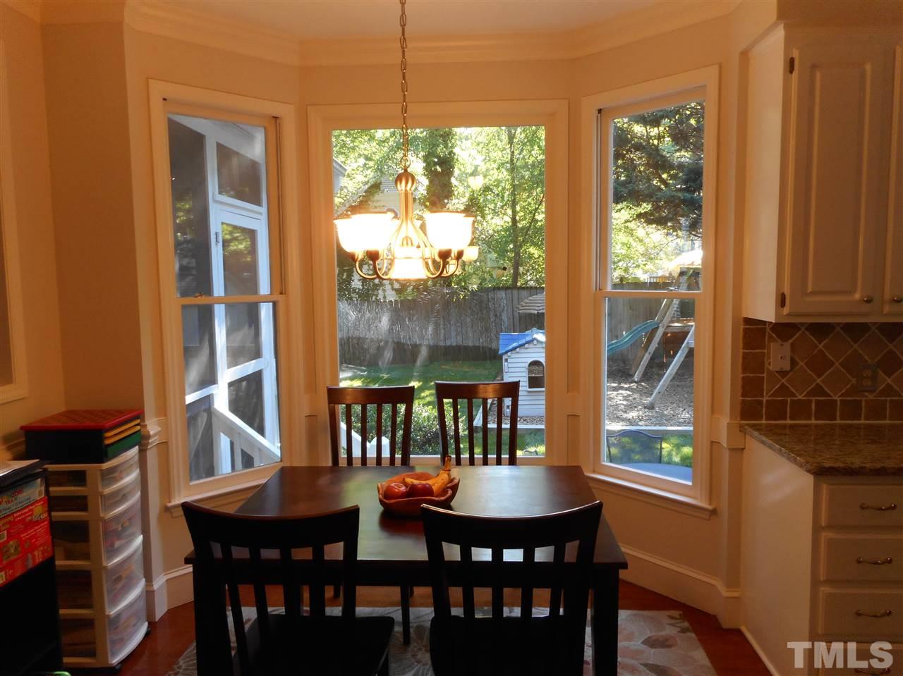 6809 Chasewick Circle Raleigh, NC 27615 - Photo 10 of 23 Nook features a bay window to the great back yard, and of course hardwood floors.
