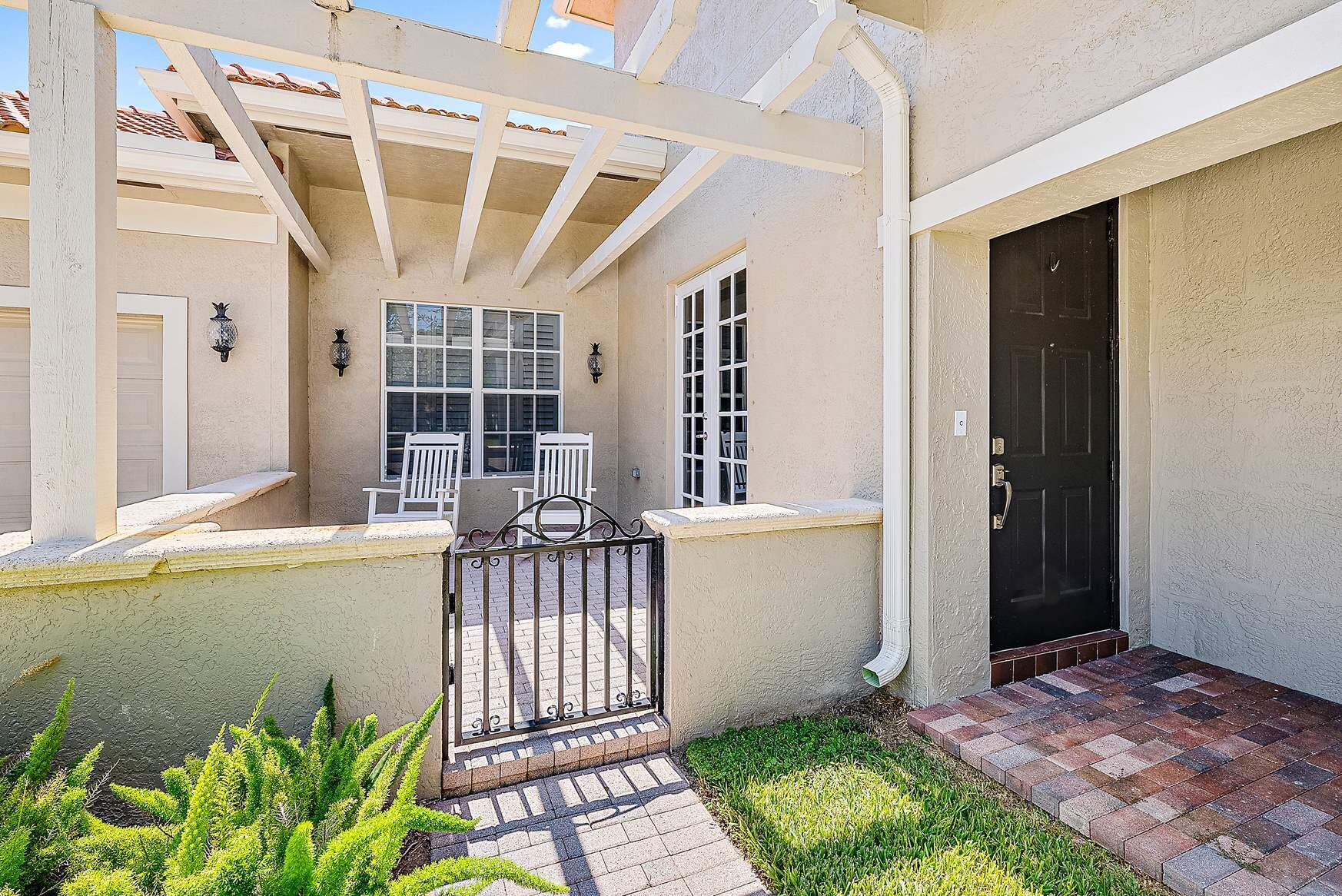 102 Via Santa Cruz Jupiter, FL 33458 - Photo 2 of 30 a view of balcony with a potted plant