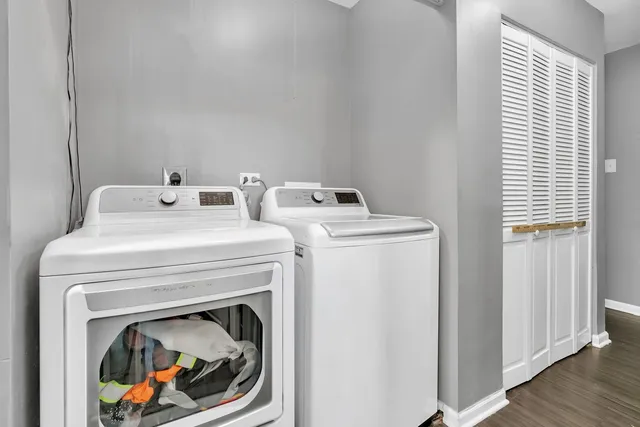 a utility room with dryer and washer
