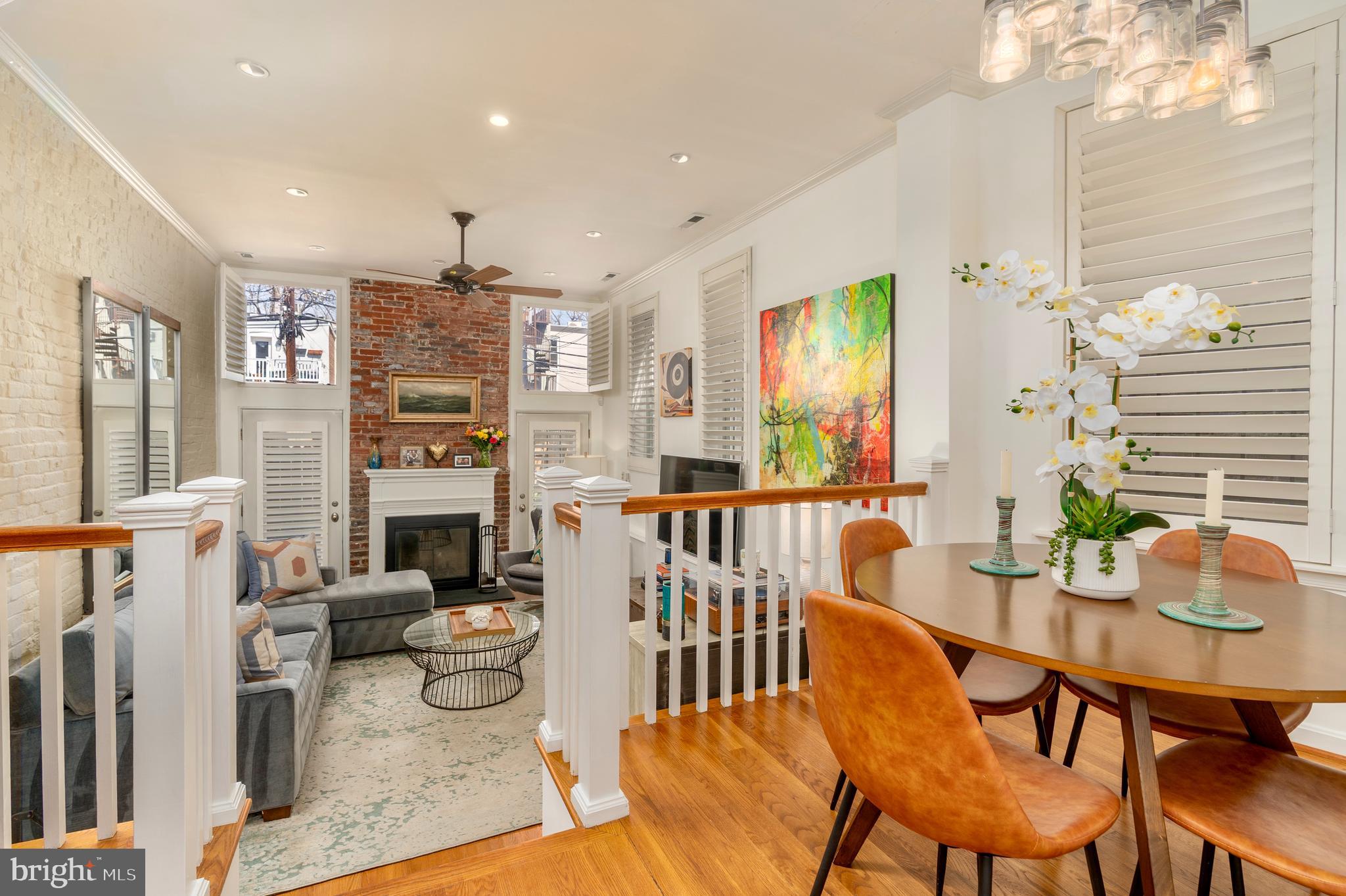 1433 S Street Northwest, Unit 2 Washington, DC 20009 - Photo 12 of 44 a view of a dining room with furniture window and wooden floor