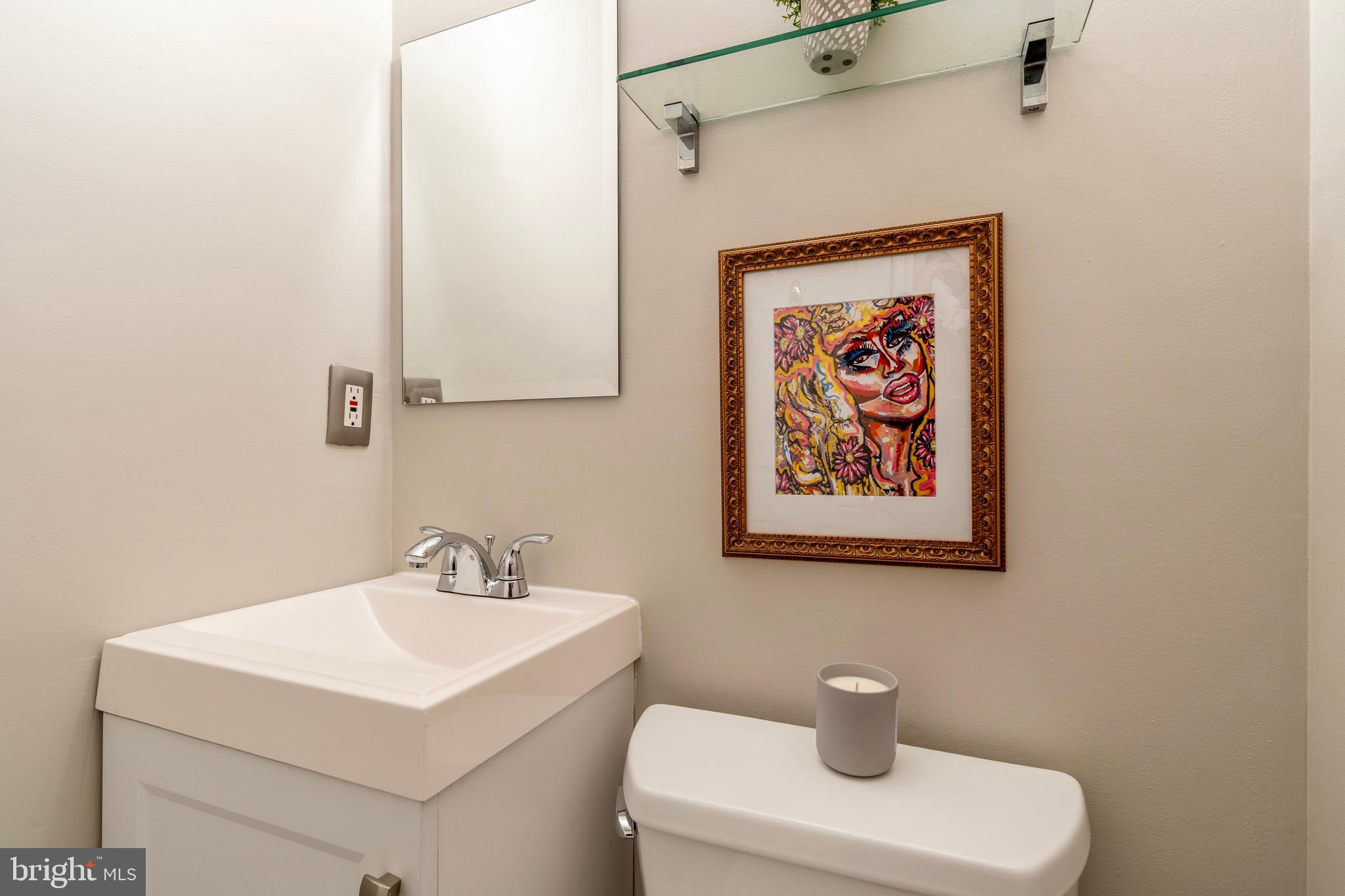 1433 S Street Northwest, Unit 2 Washington, DC 20009 - Photo 21 of 44 a bathroom with a sink mirror and toilet