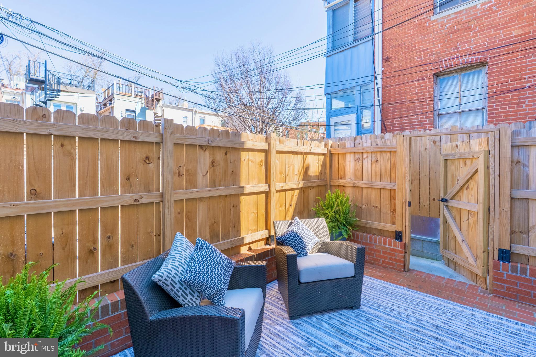1433 S Street Northwest, Unit 2 Washington, DC 20009 - Photo 22 of 44 a balcony with furniture