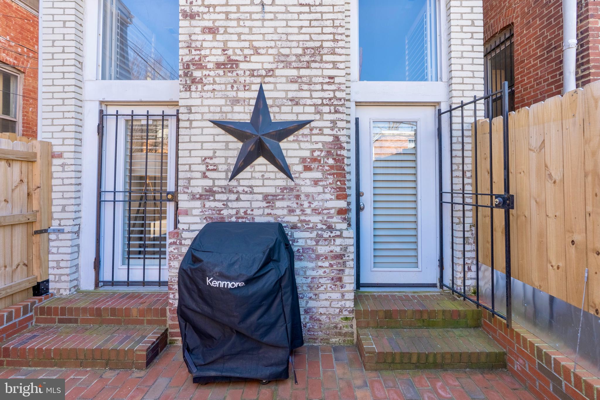 1433 S Street Northwest, Unit 2 Washington, DC 20009 - Photo 24 of 44 a view of a brick house with a large door