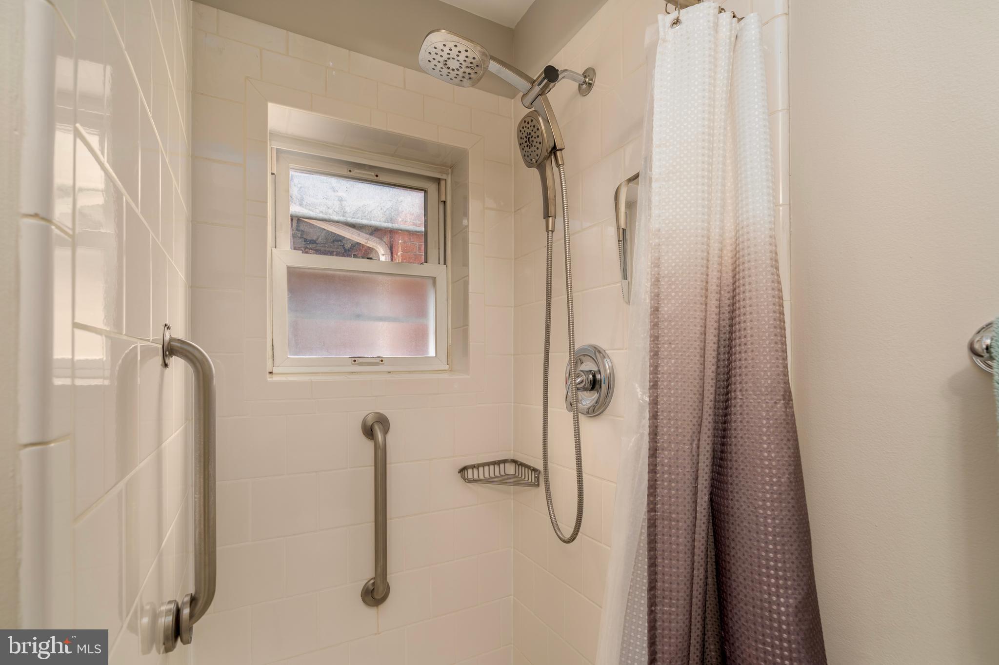 1433 S Street Northwest, Unit 2 Washington, DC 20009 - Photo 30 of 44 a bathroom with a shower