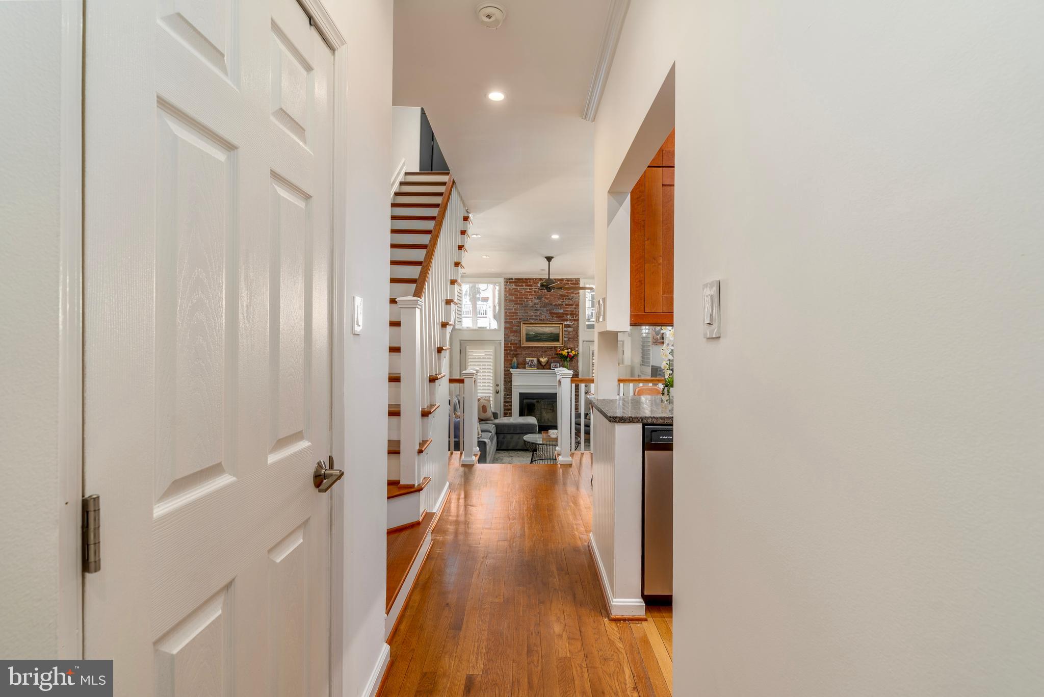1433 S Street Northwest, Unit 2 Washington, DC 20009 - Photo 3 of 44 a view of a living room with furniture and wooden floor