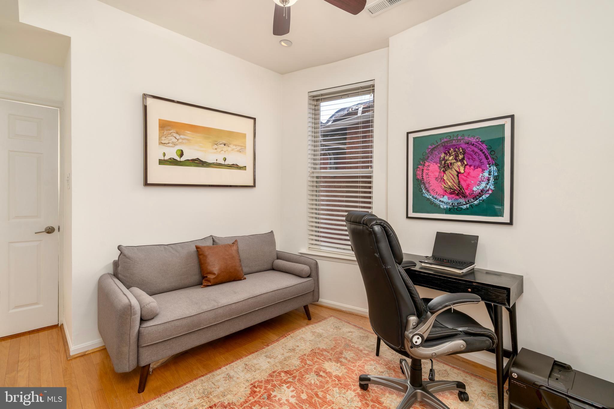 1433 S Street Northwest, Unit 2 Washington, DC 20009 - Photo 34 of 44 a living room with furniture and a window