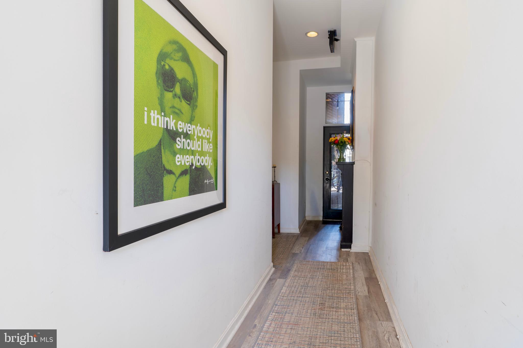 1433 S Street Northwest, Unit 2 Washington, DC 20009 - Photo 38 of 44 a view of a hallway with wooden floor and windows