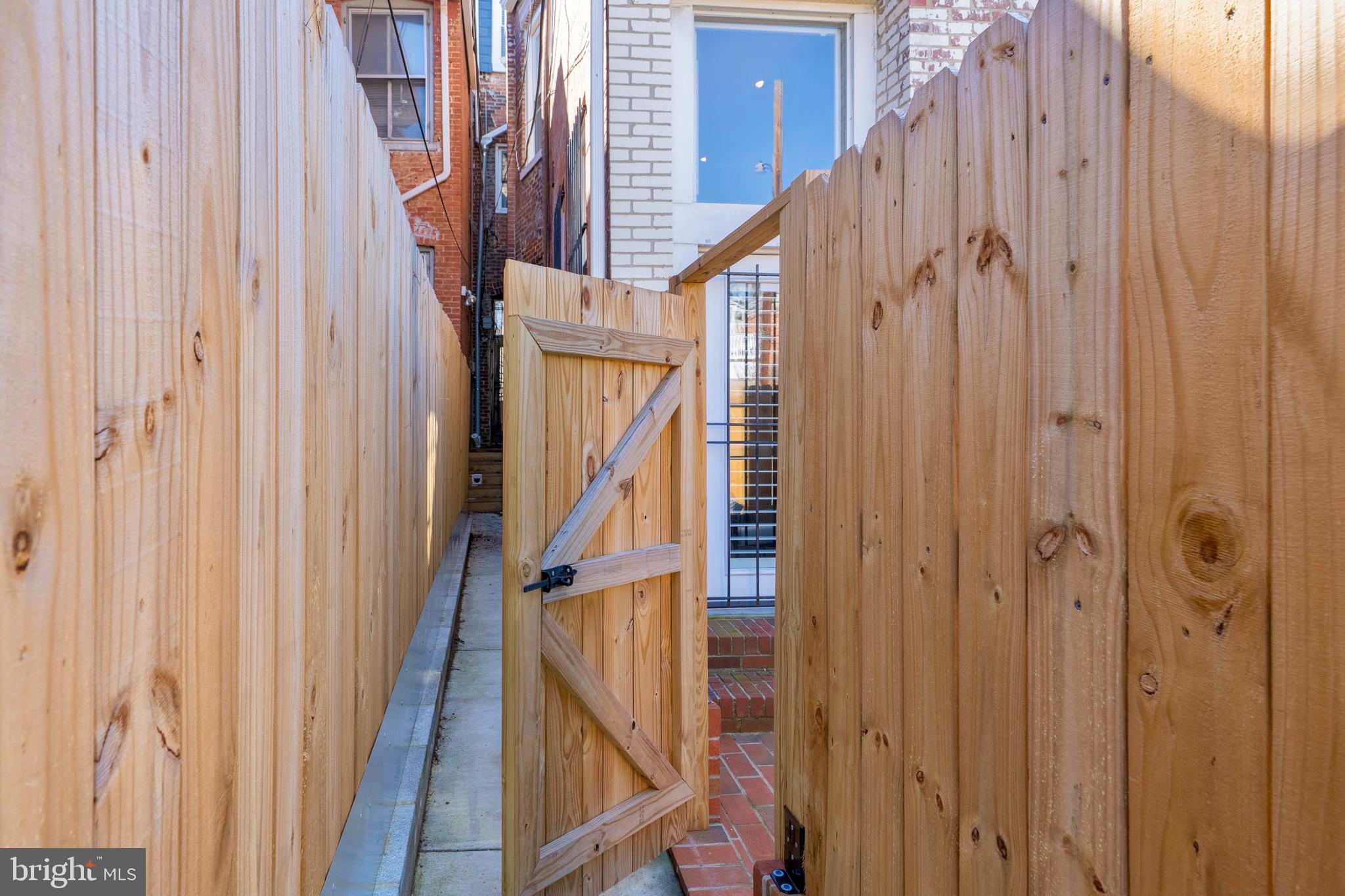1433 S Street Northwest, Unit 2 Washington, DC 20009 - Photo 41 of 44 a view of stairs with wooden floor and stairs