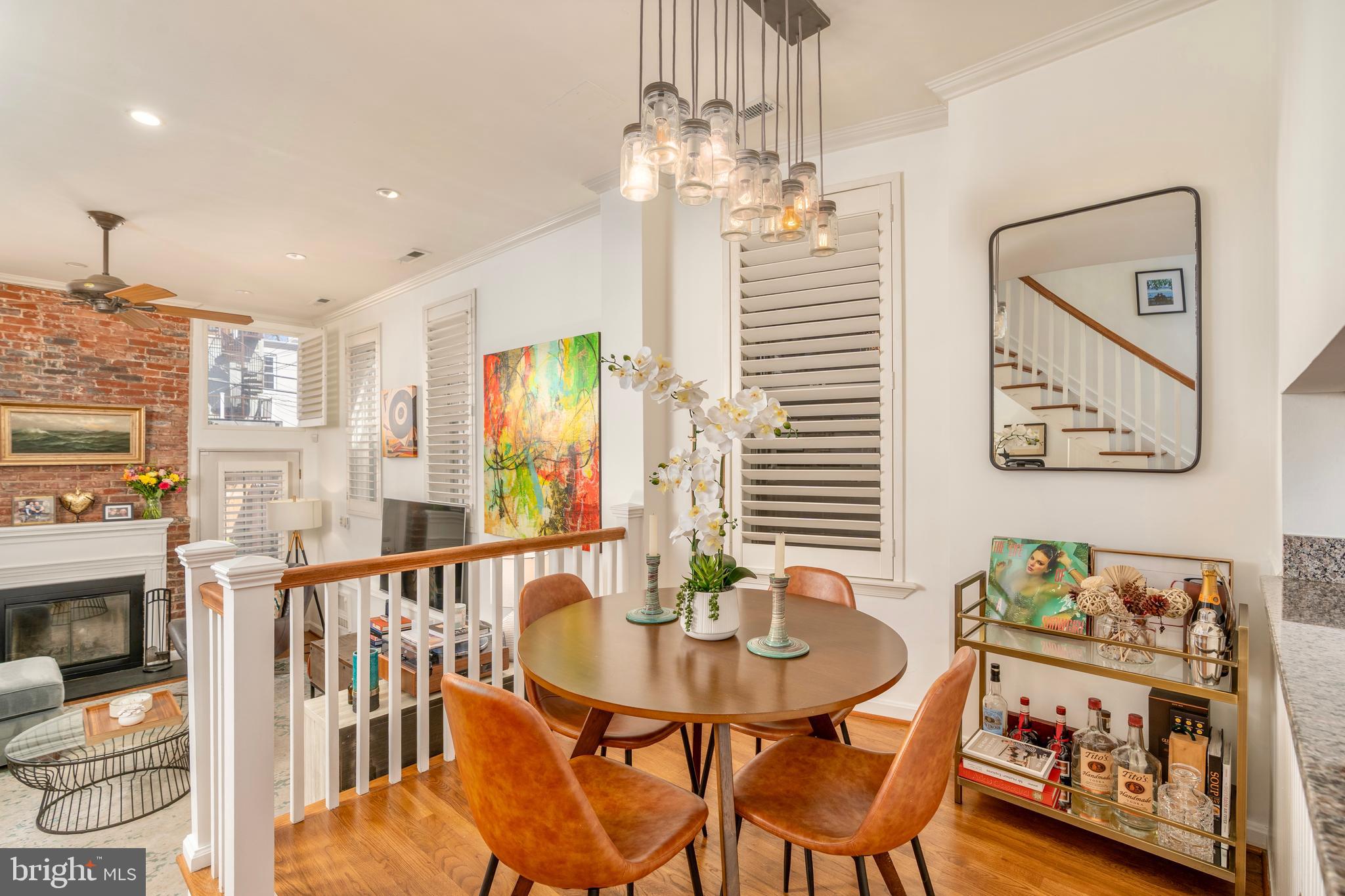 1433 S Street Northwest, Unit 2 Washington, DC 20009 - Photo 8 of 44 a view of a dining room with furniture window and wooden floor