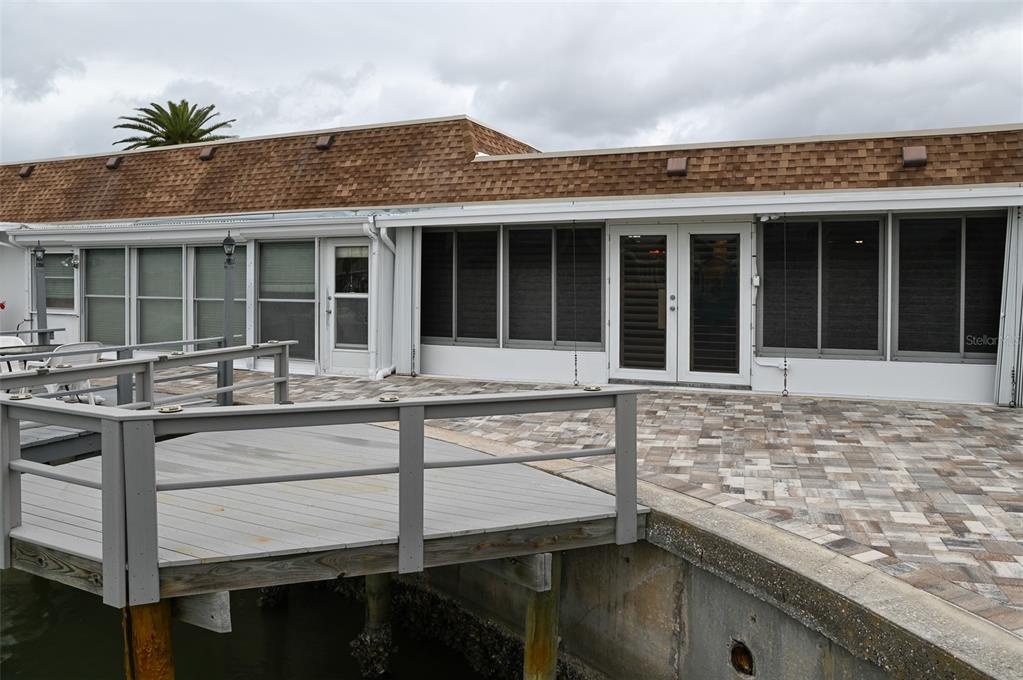 350 Boca Ciega Point Boulevard St. Petersburg, FL 33708 - Photo 21 of 25 a view of a house with a patio