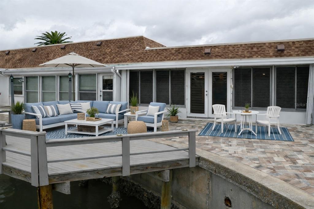 350 Boca Ciega Point Boulevard St. Petersburg, FL 33708 - Photo 22 of 25 a view of a house with sitting area