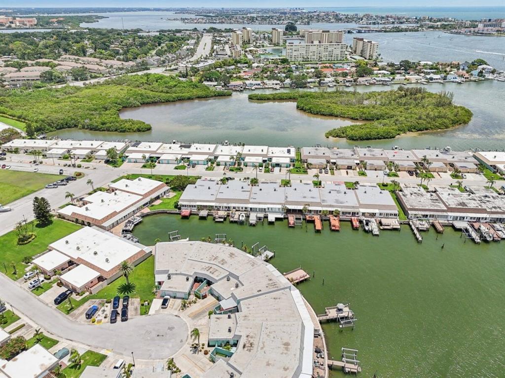 350 Boca Ciega Point Boulevard St. Petersburg, FL 33708 - Photo 24 of 32 an aerial view of a house with a lake view