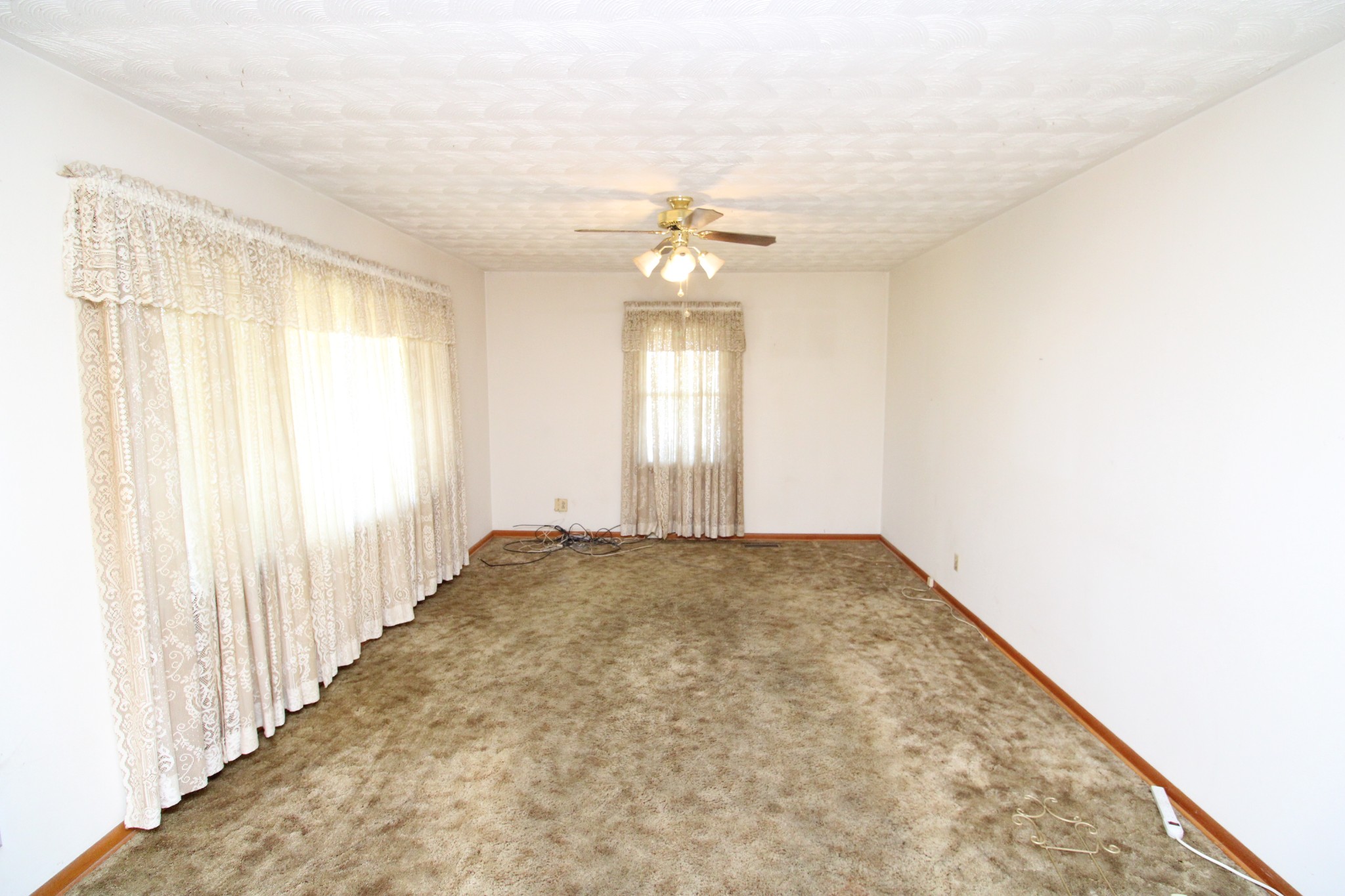 1984 Celina Road Red Boiling Springs, TN 37150 - Photo 13 of 28 wooden floor in an empty room with a window