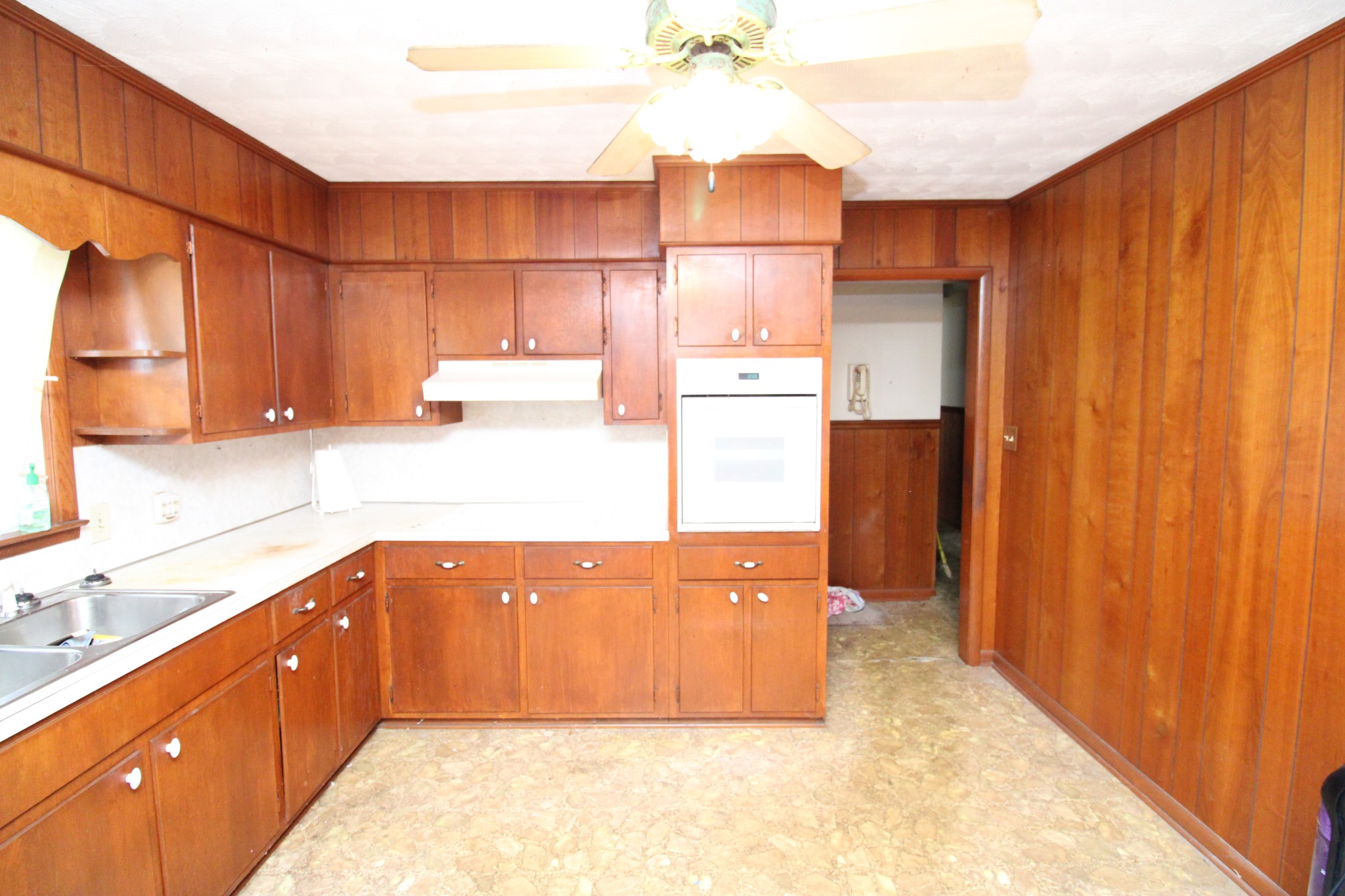1984 Celina Road Red Boiling Springs, TN 37150 - Photo 15 of 28 a kitchen with stainless steel appliances granite countertop a sink refrigerator and cabinets