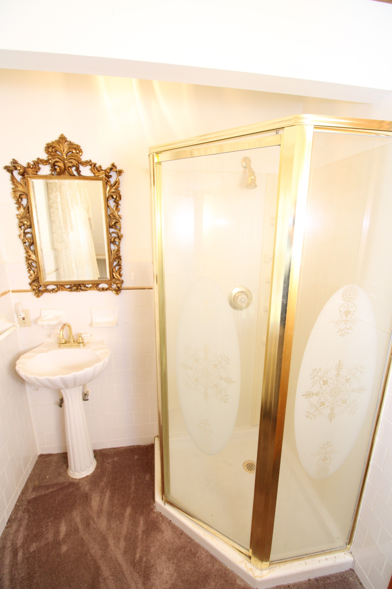 1984 Celina Road Red Boiling Springs, TN 37150 - Photo 20 of 28 a bathroom with a sink a mirror and a shower