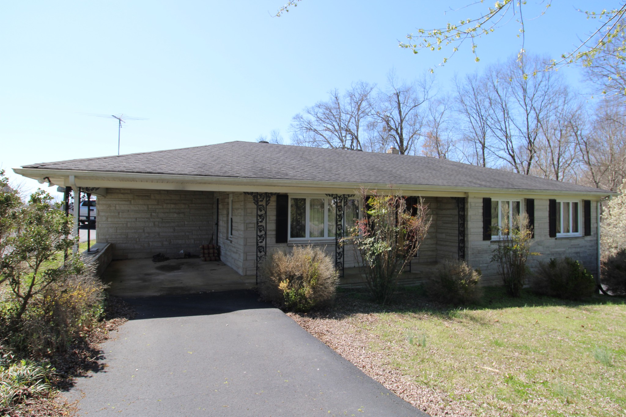 1984 Celina Road Red Boiling Springs, TN 37150 - Photo 2 of 28 a front view of a house with garden