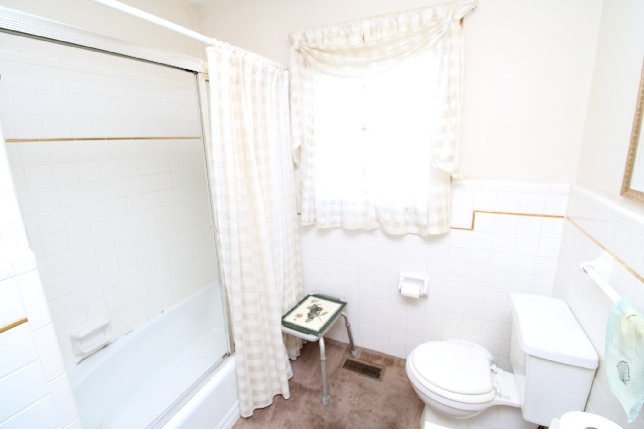 1984 Celina Road Red Boiling Springs, TN 37150 - Photo 23 of 28 a white toilet sitting next to a bathroom sink