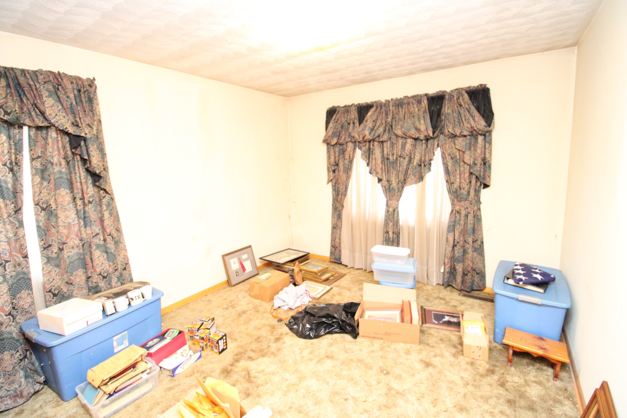 1984 Celina Road Red Boiling Springs, TN 37150 - Photo 24 of 28 a bedroom with a bed and wooden floor