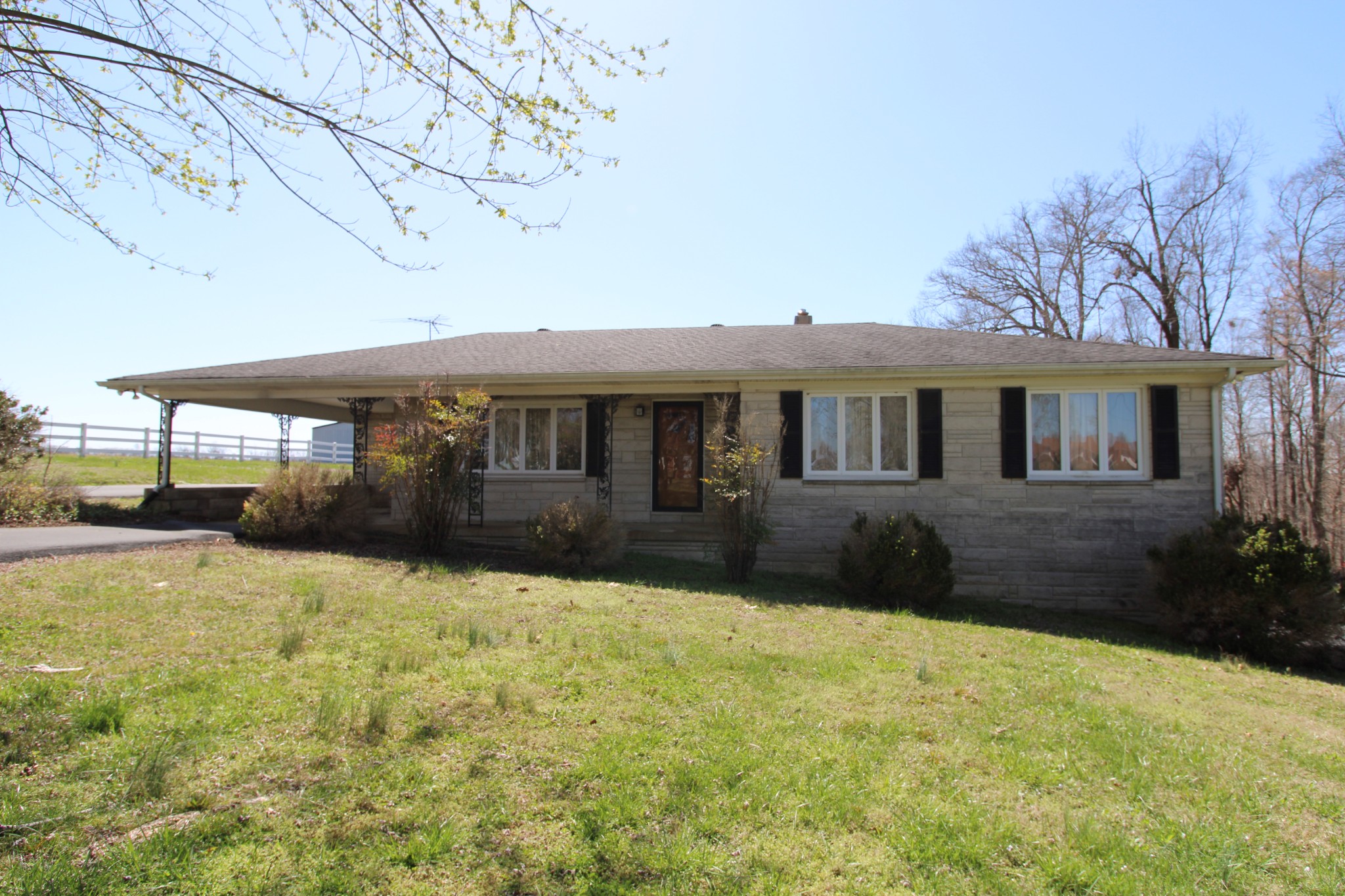 1984 Celina Road Red Boiling Springs, TN 37150 - Photo 3 of 28 a front view of a house with a yard