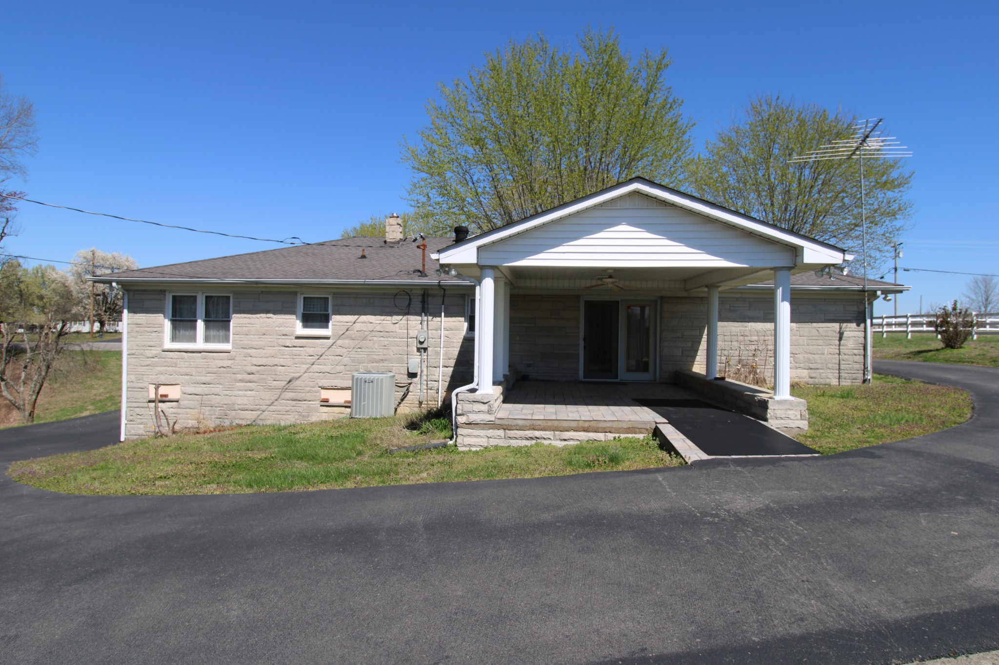 1984 Celina Road Red Boiling Springs, TN 37150 - Photo 6 of 28 a front view of a house with a yard and garage