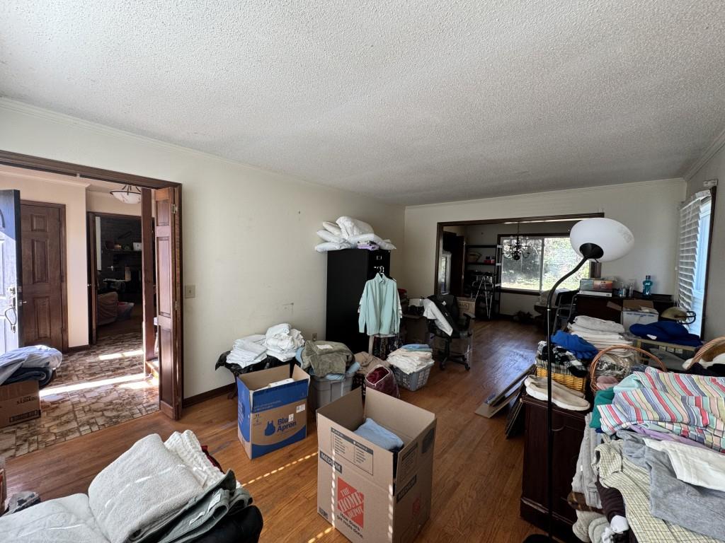 4703 Marc Court Southwest Lilburn, GA 30047 - Photo 20 of 57 a living room with furniture and a wooden floor
