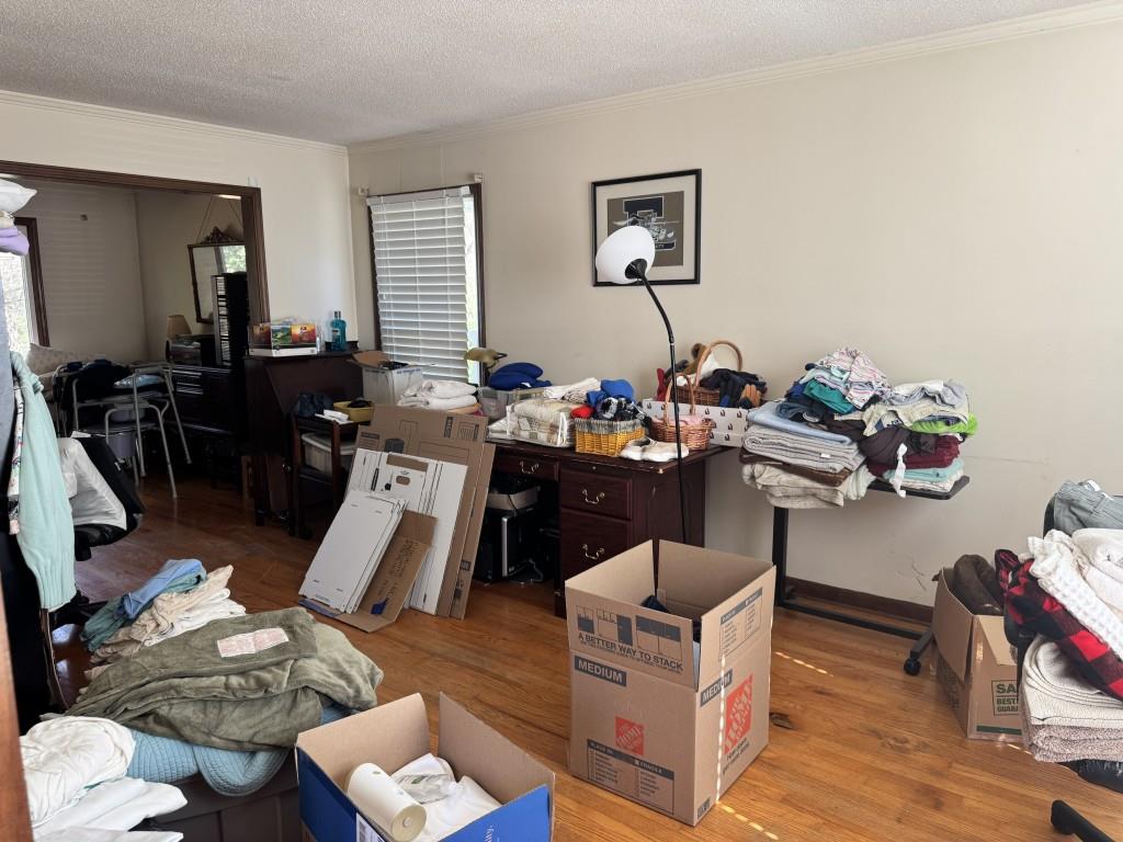 4703 Marc Court Southwest Lilburn, GA 30047 - Photo 22 of 57 a living room with furniture and wooden floor