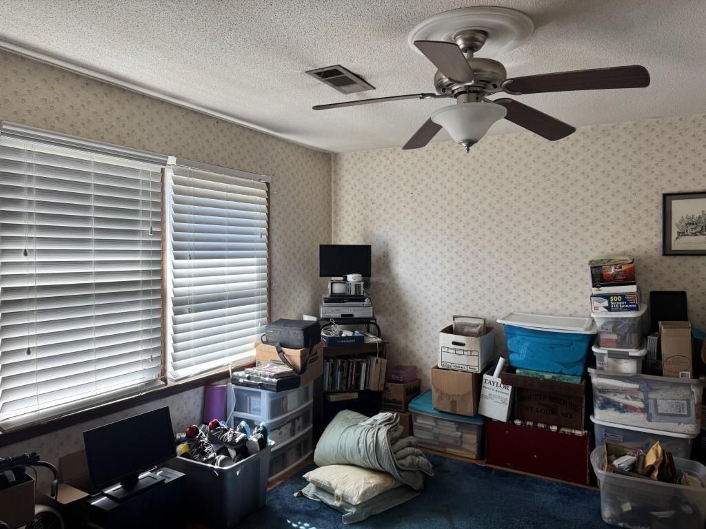 4703 Marc Court Southwest Lilburn, GA 30047 - Photo 33 of 57 a bedroom with furniture and a window