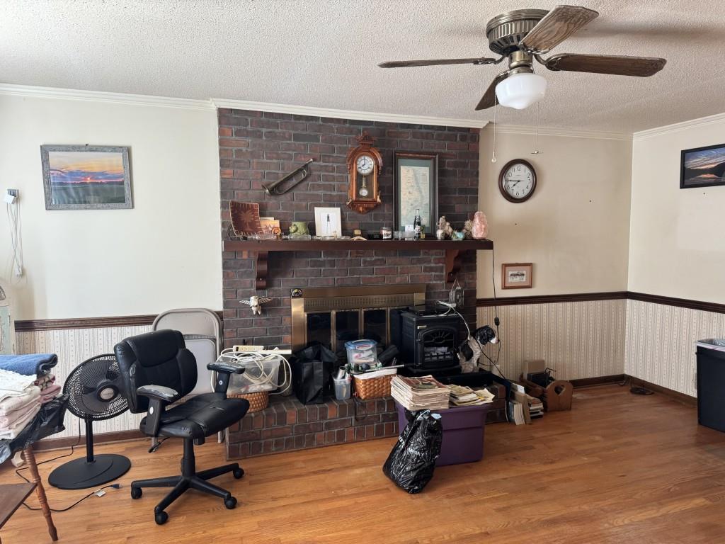 4703 Marc Court Southwest Lilburn, GA 30047 - Photo 6 of 57 a living room with furniture and a fireplace
