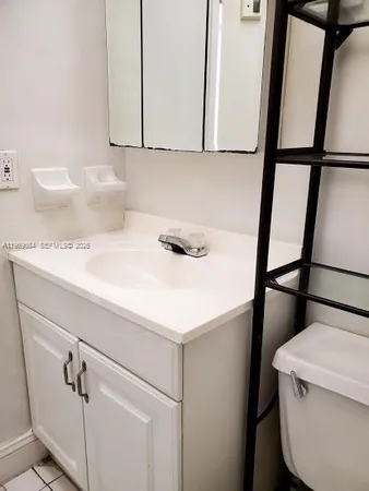 a bathroom with a sink and a vanity
