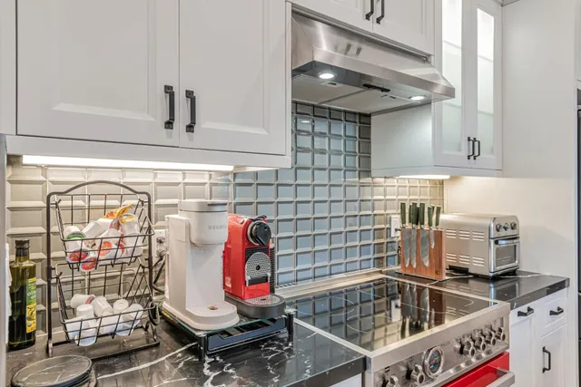 a bathroom with a bathtub and shower
