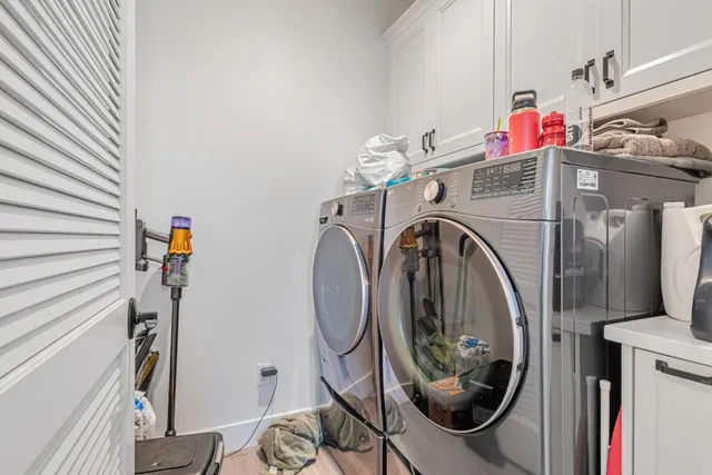 a bathroom with a sink vanity and a mirror