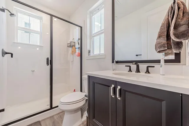 a front view of a building with garden