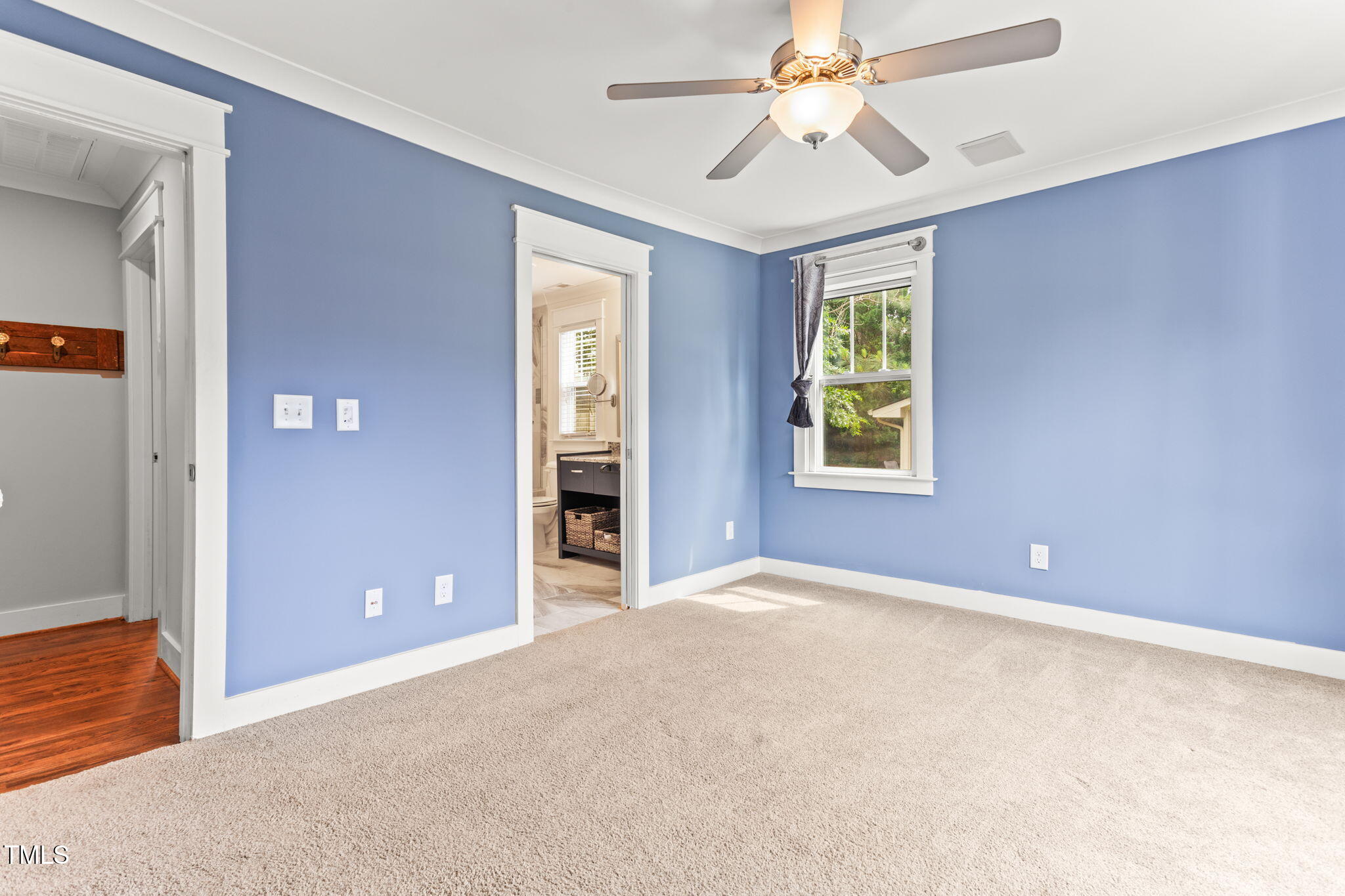 305 Georgetown Road Raleigh, NC 27608 - Photo 21 of 40 an empty room with windows and closet