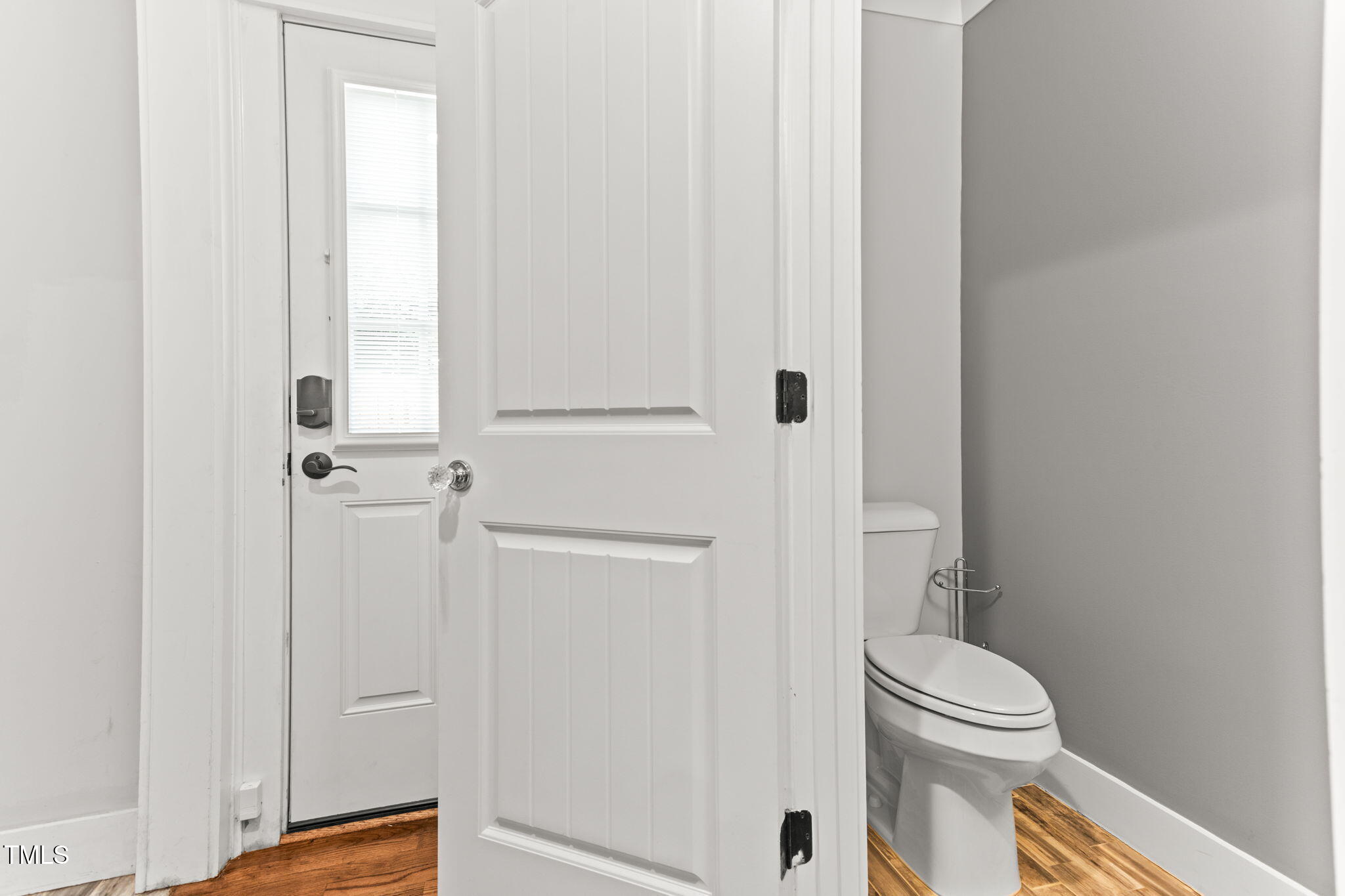 305 Georgetown Road Raleigh, NC 27608 - Photo 33 of 40 a bathroom with a toilet and a shower