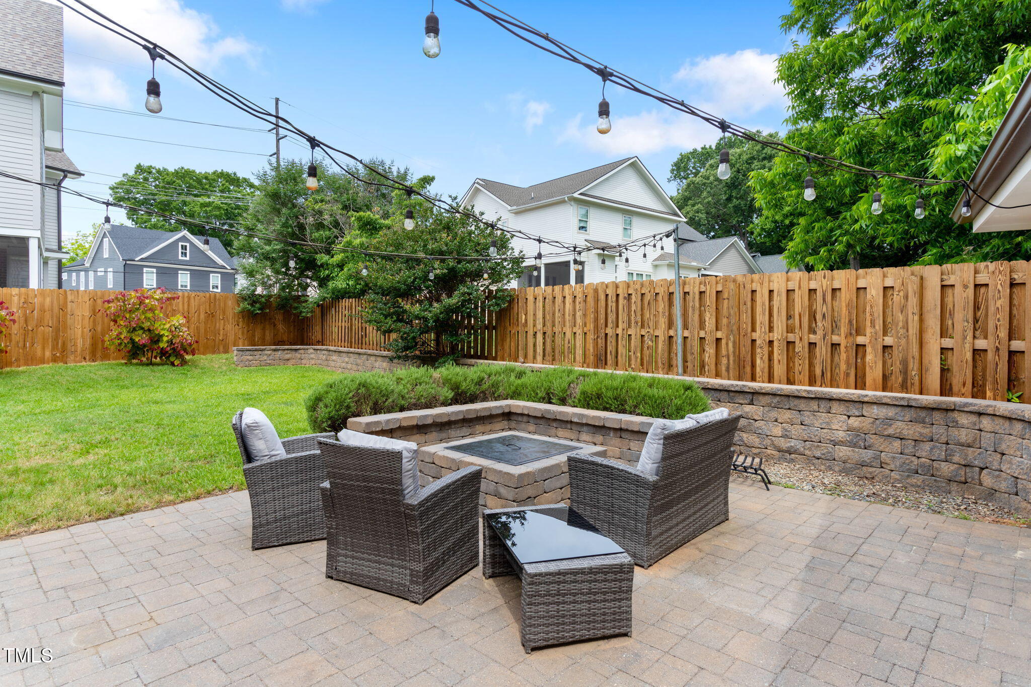 305 Georgetown Road Raleigh, NC 27608 - Photo 35 of 40 a view of a patio with a yard