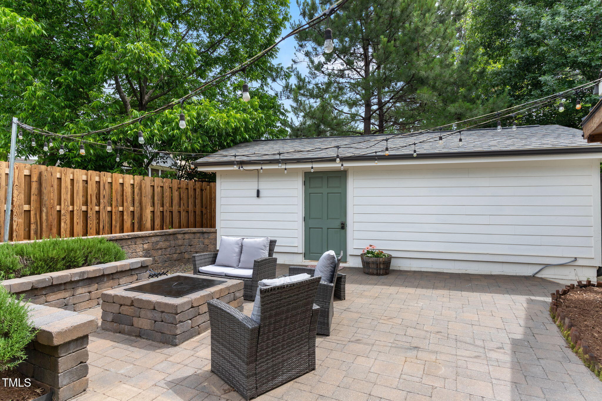 305 Georgetown Road Raleigh, NC 27608 - Photo 36 of 40 a view of backyard with outdoor seating and green space