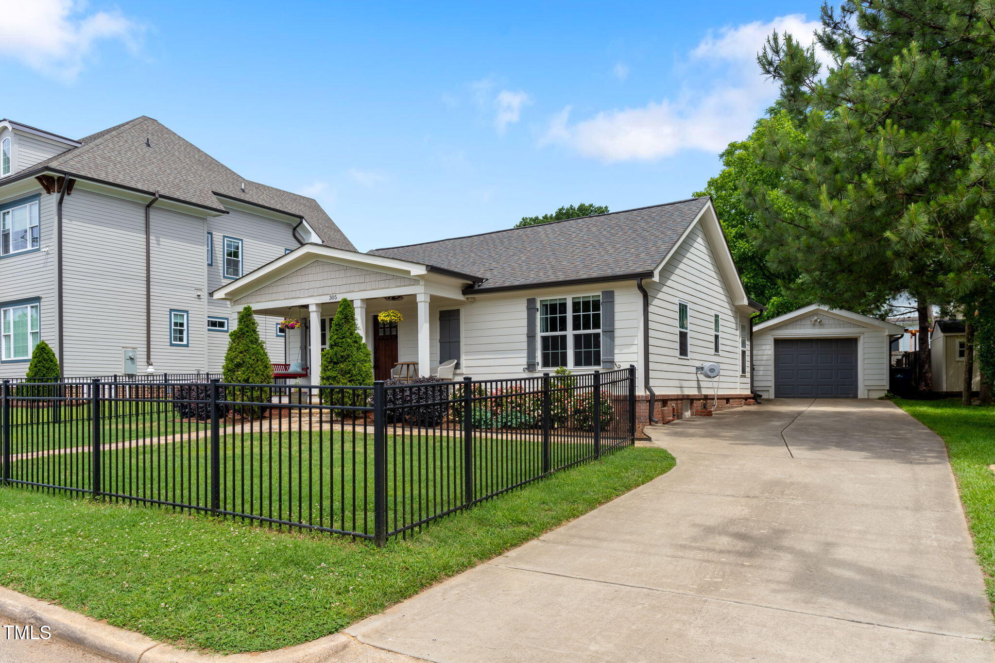 305 Georgetown Road Raleigh, NC 27608 - Photo 40 of 40 a view of a house with a yard and porch