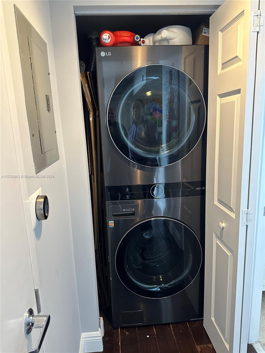 3232 Southwest 22nd Terrace, Unit 1903 Miami, FL 33145 - Photo 14 of 30 a utility room with dryer and washer
