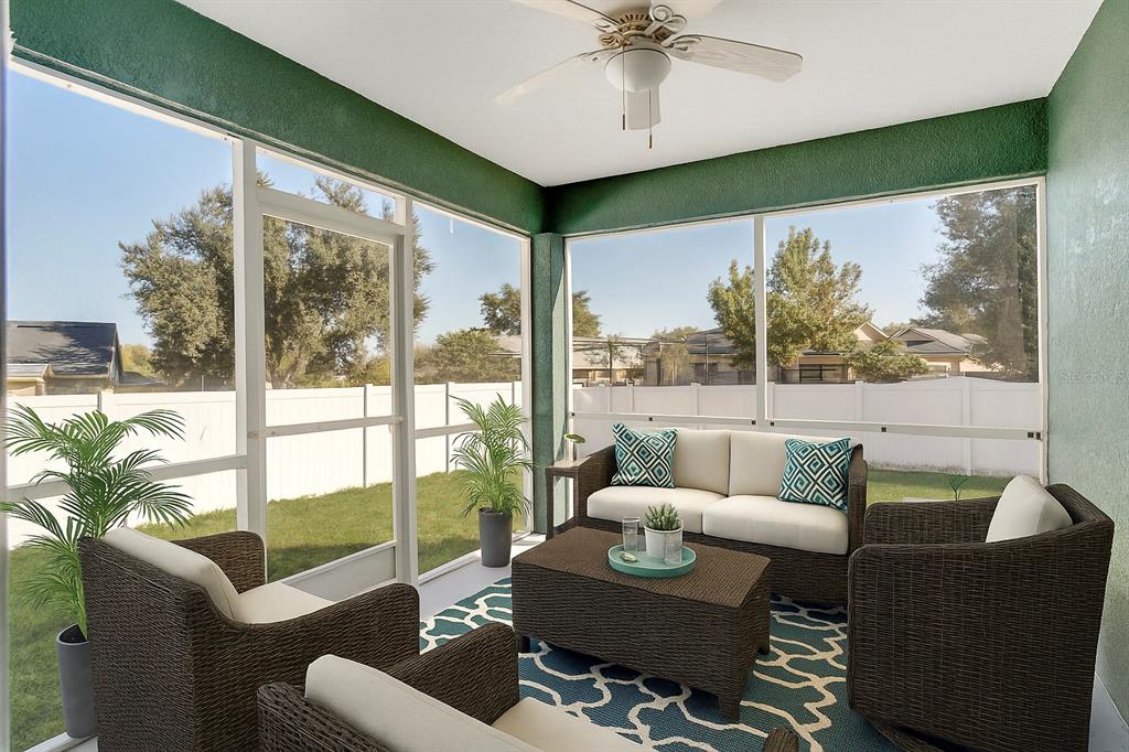 108 Brittany Road Mascotte, FL 34753 - Photo 16 of 23 a living room with furniture and a large window