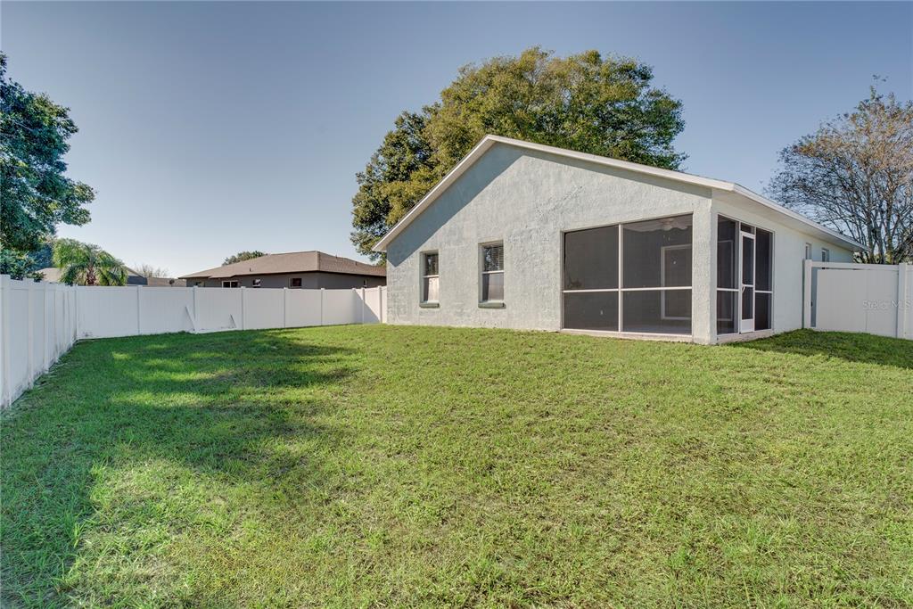 108 Brittany Road Mascotte, FL 34753 - Photo 17 of 23 a house with a tree in front of the house