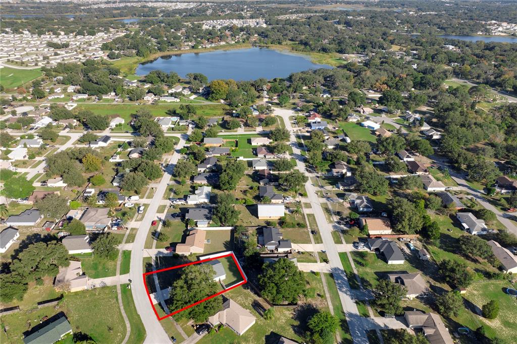 108 Brittany Road Mascotte, FL 34753 - Photo 23 of 23 an aerial view of residential houses with outdoor space
