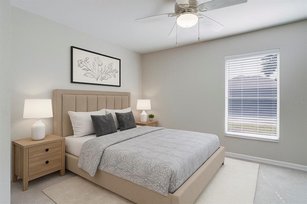 108 Brittany Road Mascotte, FL 34753 - Photo 4 of 23 a bedroom with a bed and a window