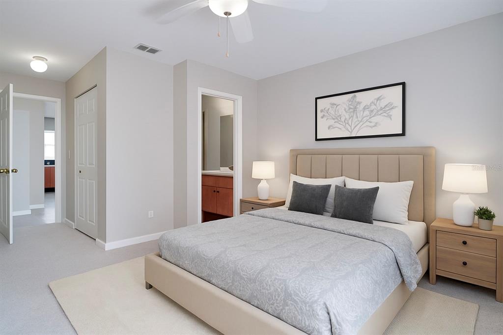 108 Brittany Road Mascotte, FL 34753 - Photo 5 of 23 a bedroom with a bed and a night stand