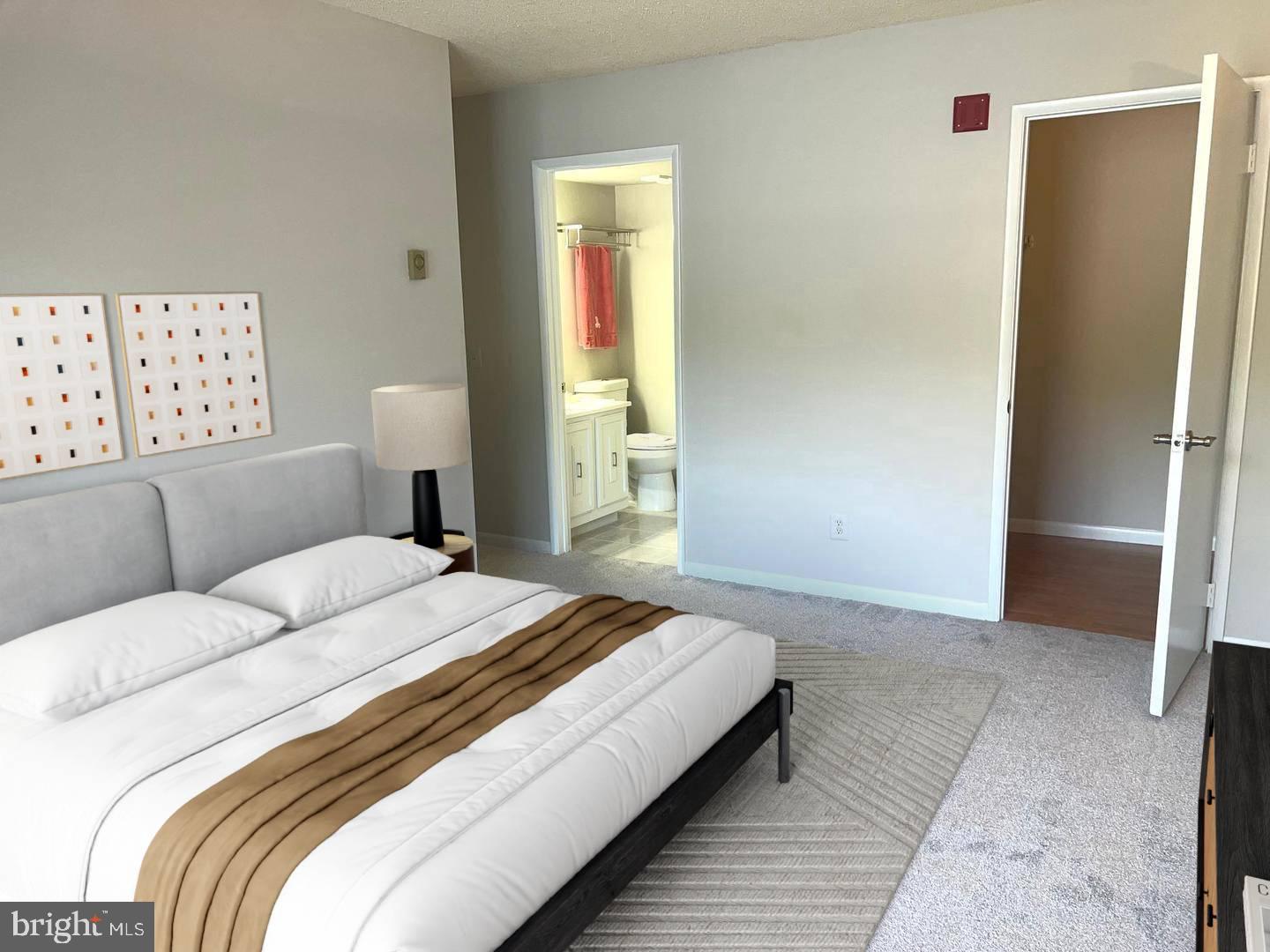 15300 Beaverbrook Court, Unit 882B Silver Spring, MD 20906 - Photo 15 of 44 a bedroom with a bed and a window