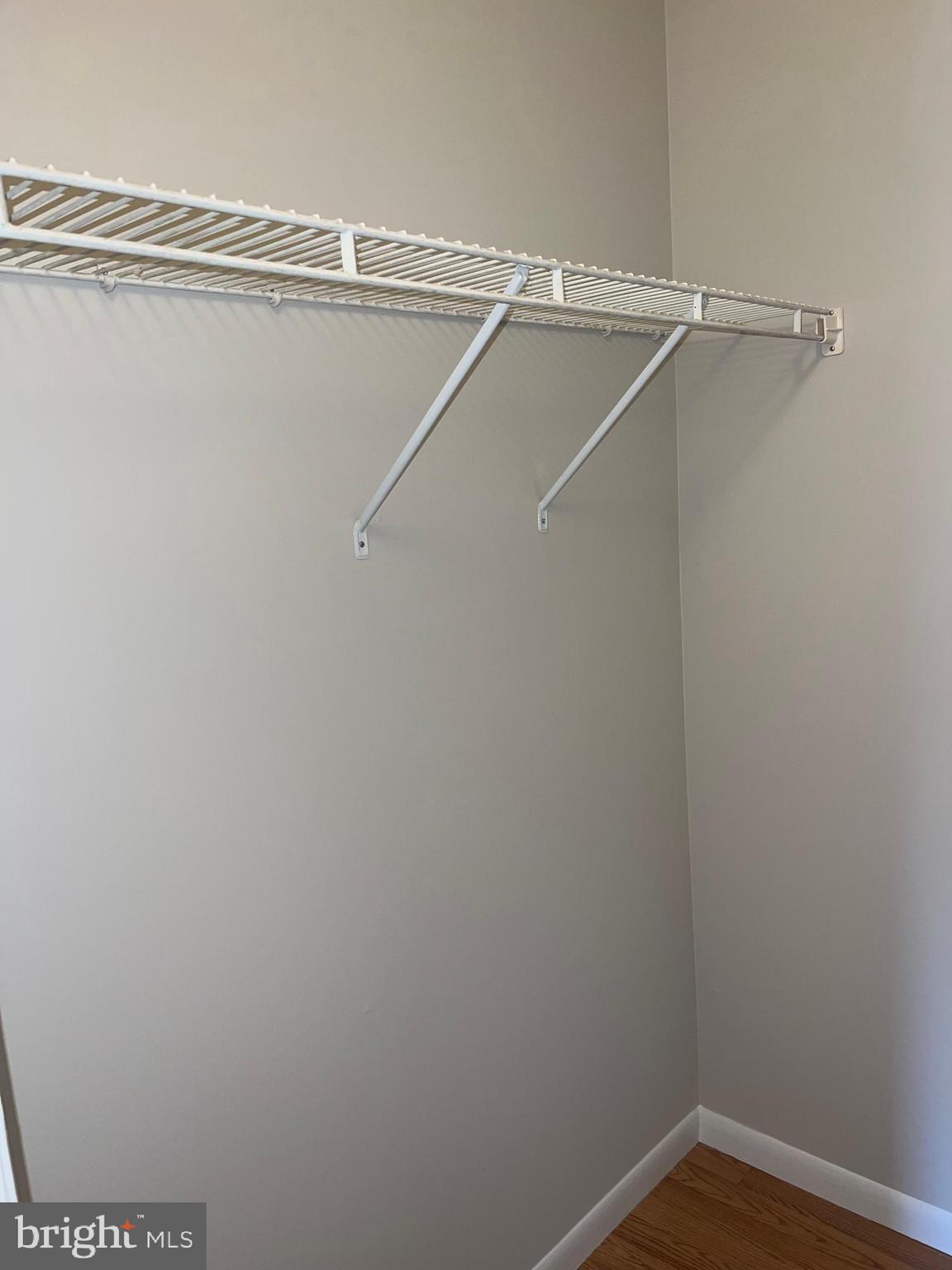 15300 Beaverbrook Court, Unit 882B Silver Spring, MD 20906 - Photo 18 of 44 a view of a room with racks on the wall